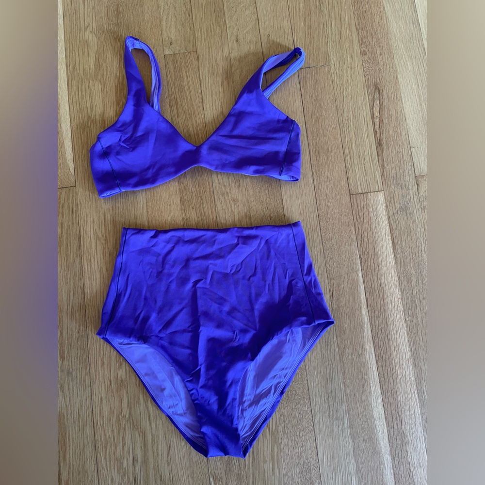 Left on Friday suit in “bon voyage”